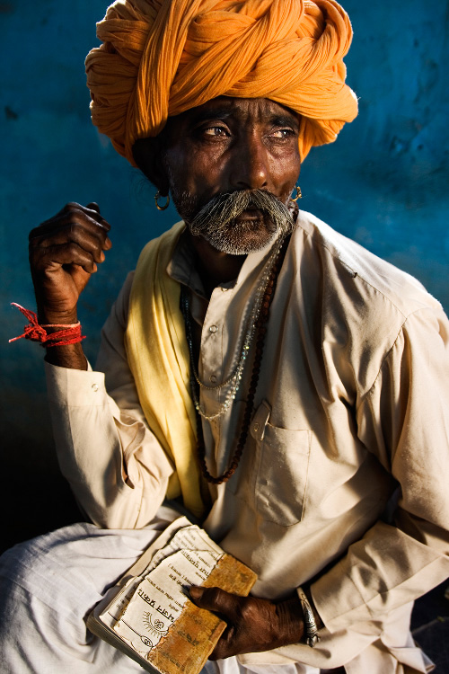 Man with a Religious Songs Book - Outskirts of Bundi, India