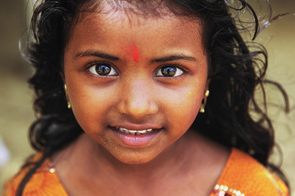 Little girl in Poovar India