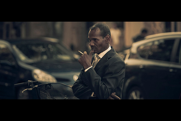 Black Suit & Cigarette - 35 Awesome Examples of Cinematic Photography