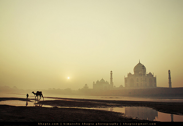 Taj Mahal with a Camel and his owner by Himanshu Khagta