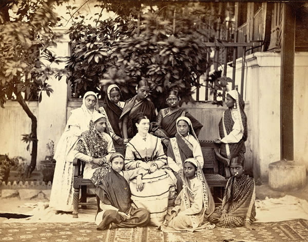European Mistress Seated in the Centre of a Group of Ten Female Pupils, Government Normal School, Bombay (Mumbai) - 1873