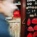 Colorful trinkets and red fez hats displayed at a Moroccan medina market stall