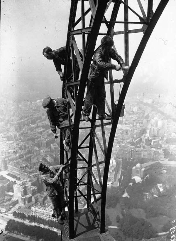 Painting the Eiffel Tower, 1932.