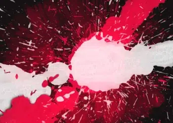 Abstract red and white paint splatter explosion on a dark background