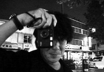 Daido Moriyama Uses An Ordinary Compact Camera And Never Stops Shooting