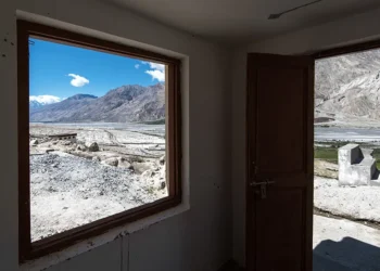 _Ladakh mountain valley viewed through a room's window and open door