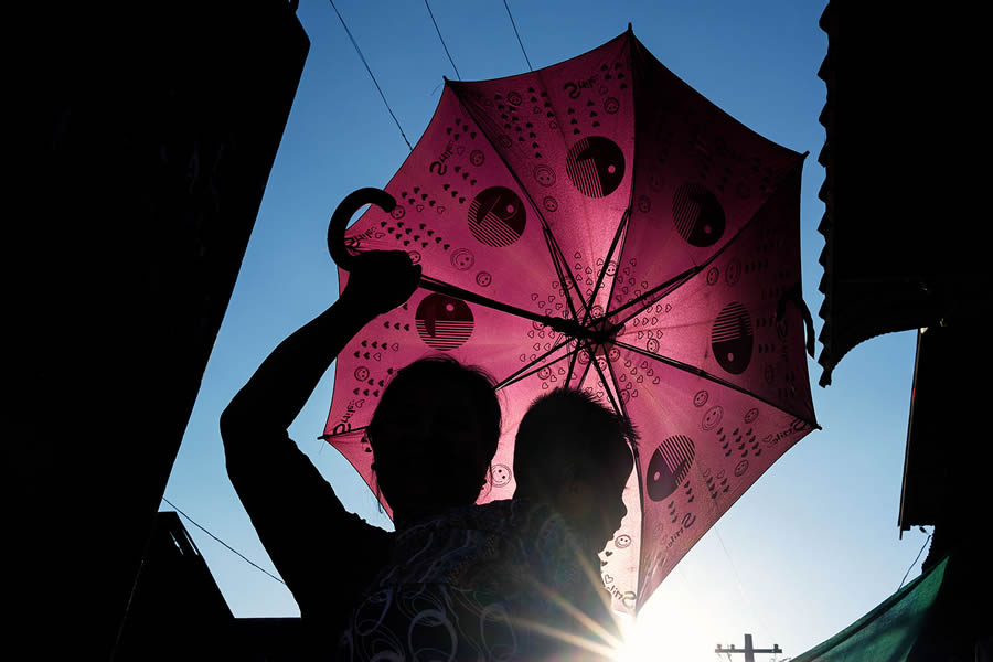 Umbrella - Mawlamyine, Myanmar - Street Photography and the art of composition photos