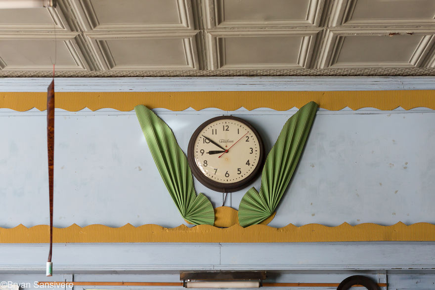 An old clock still hangs on the wall