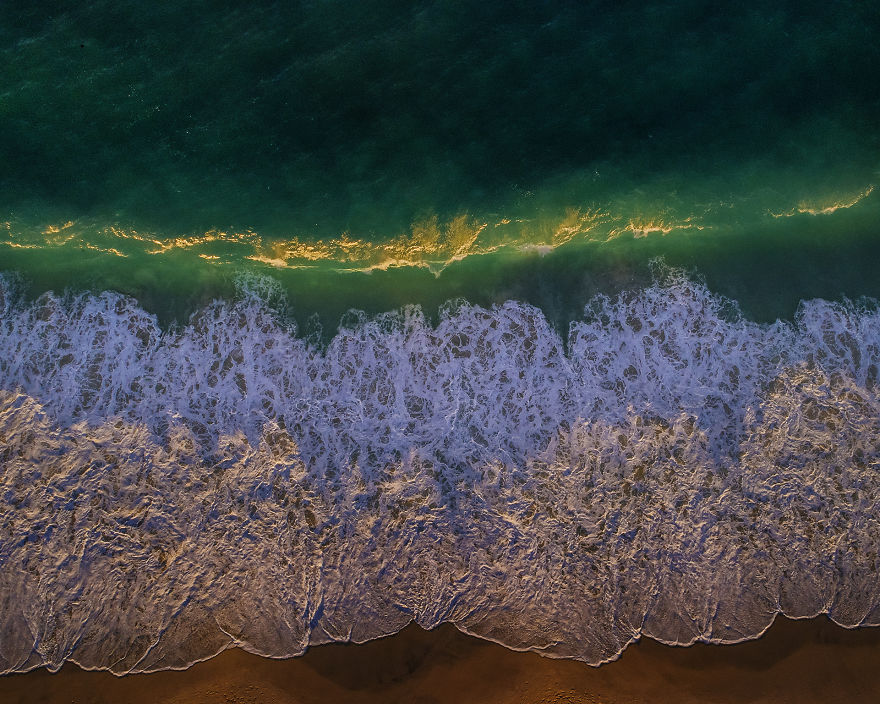 Drone Shots Of The Surfers On Llandudno Beach By Antti Viitala