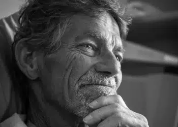 Close-up portrait of a thoughtful older man, black and white photo