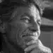 Close-up portrait of a thoughtful older man, black and white photo