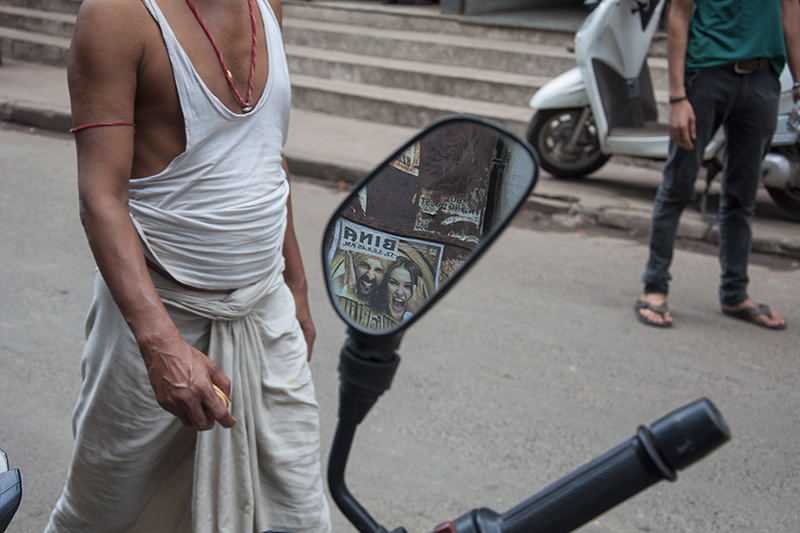 Conversing With The Posters: Street Photography Series By Niladri Adhikary