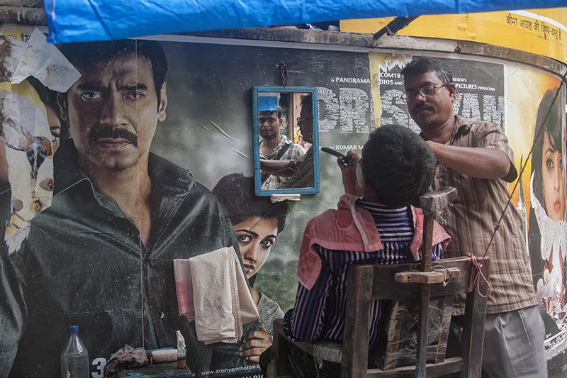 Conversing With The Posters: Street Photography Series By Niladri Adhikary