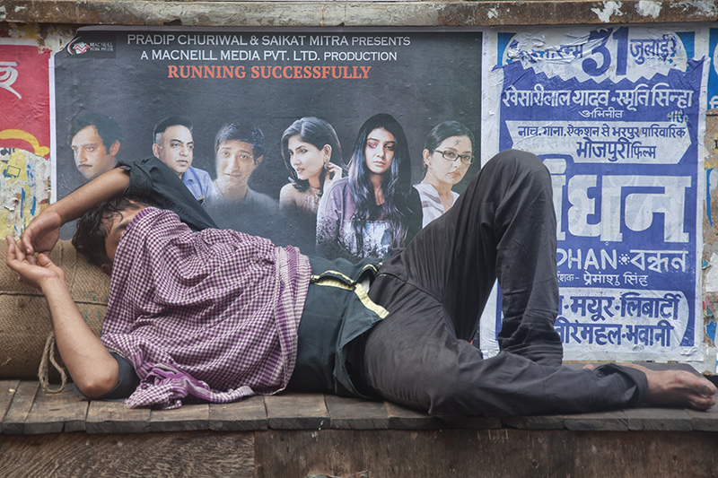 Conversing With The Posters: Street Photography Series By Niladri Adhikary