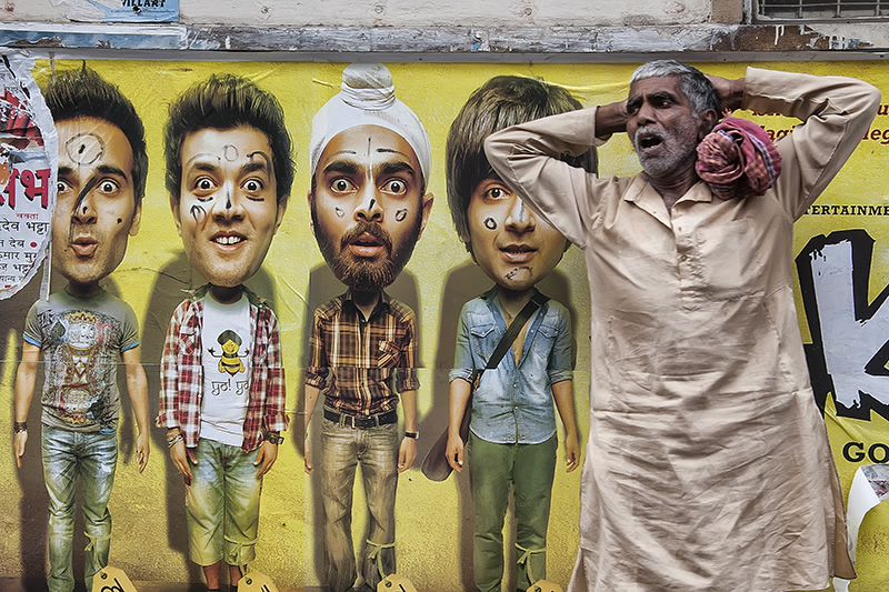 Conversing With The Posters: Street Photography Series By Niladri Adhikary