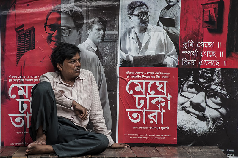 Conversing With The Posters: Street Photography Series By Niladri Adhikary