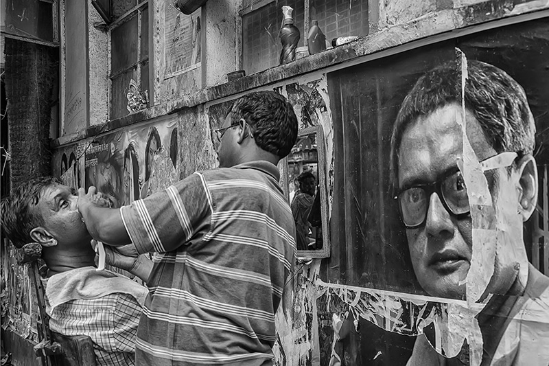 Conversing With The Posters: Street Photography Series By Niladri Adhikary