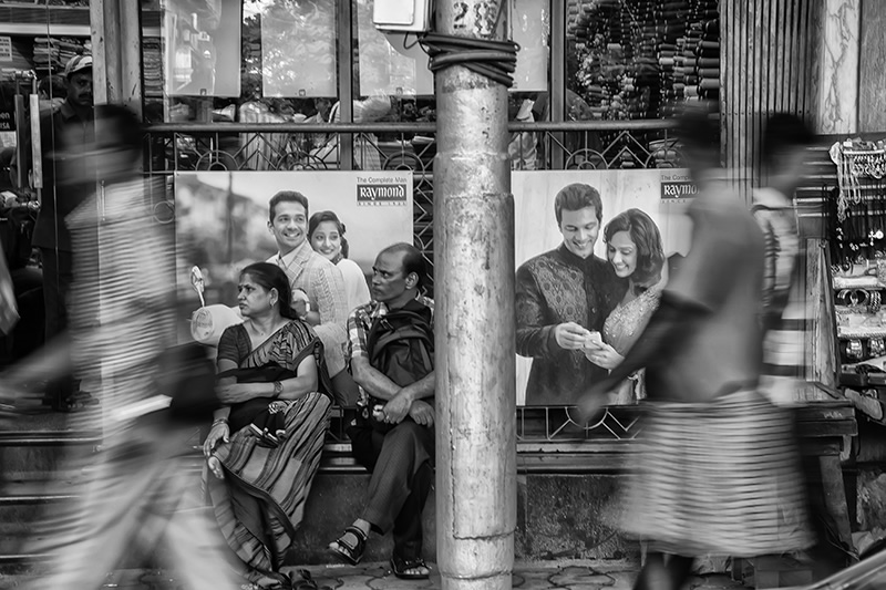 Conversing With The Posters: Street Photography Series By Niladri Adhikary