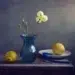 Still life with blue glass vase, white flowers, and two lemons on a table