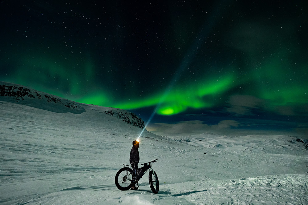 Kungsleden: Cycling Under Aurora Borealis by Jakub Rybicki