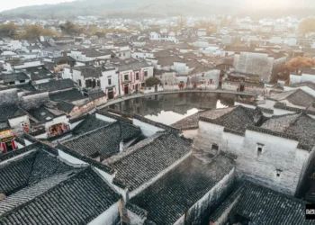 Aerial view of ancient Hui village with circular pond, China