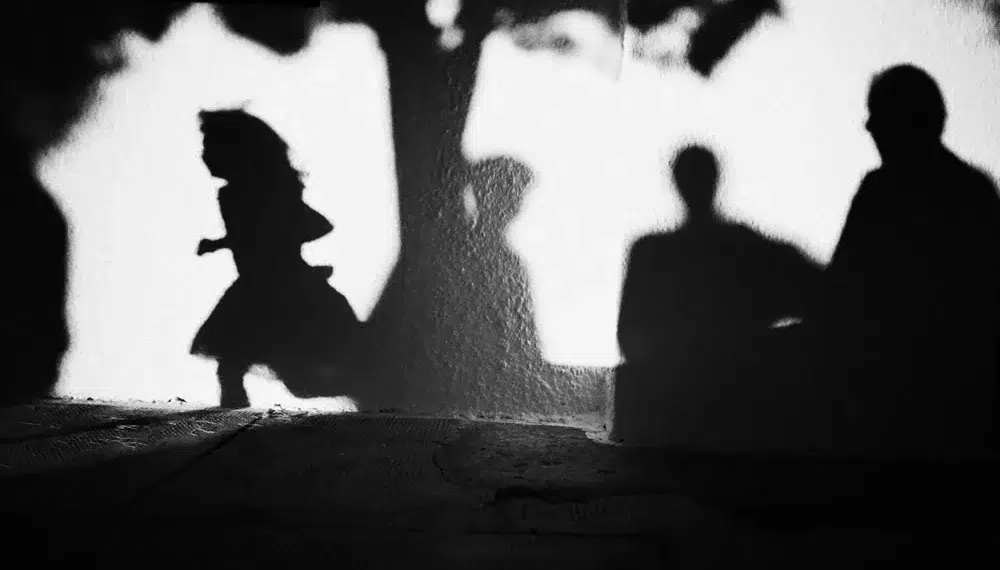Stavros Stamatiou: Brilliant Street Photographer From Greece 37 Child and adult shadows cast on a bright white wall, black and white