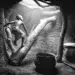 The Daily Life Of African Tribes: Daring & Splendid Photographs By Mario Gerth 111 Child climbing in a rustic hut, african tribes photos in black and white