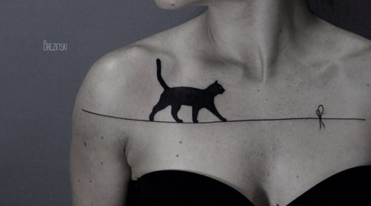 Tattoo Artist Creates Black Ink Tattoo Designs That Flow With The Body’s Curvature