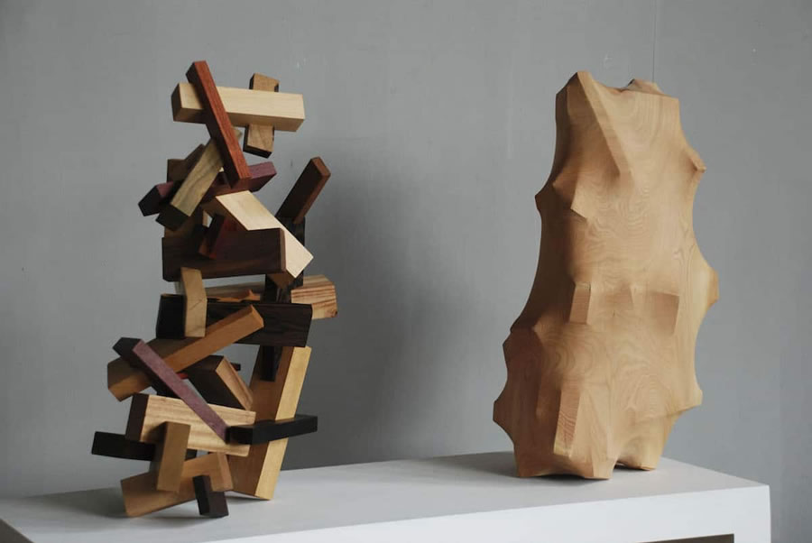 Esculturas esculpidas em madeira por Tung Ming-Chin