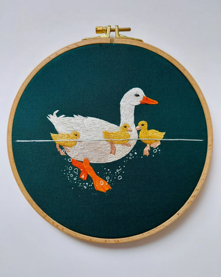 Embroideries Of Animals Plunging Into The Water by Megan Zaniewski