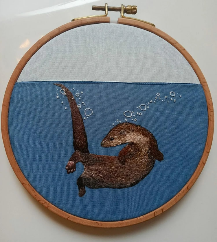 Embroideries Of Animals Plunging Into The Water by Megan Zaniewski