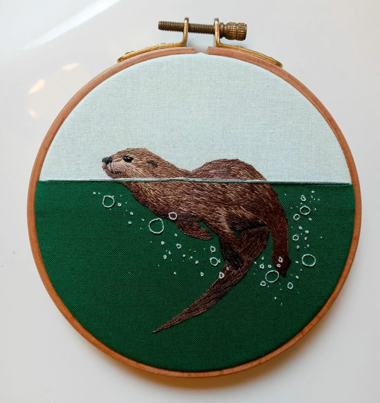 Embroideries Of Animals Plunging Into The Water by Megan Zaniewski