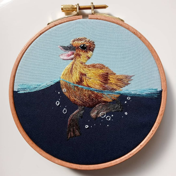 Embroideries Of Animals Plunging Into The Water by Megan Zaniewski