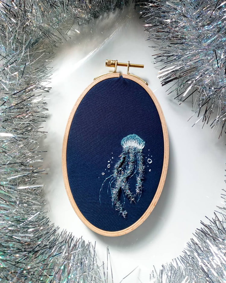 Embroideries Of Animals Plunging Into The Water by Megan Zaniewski