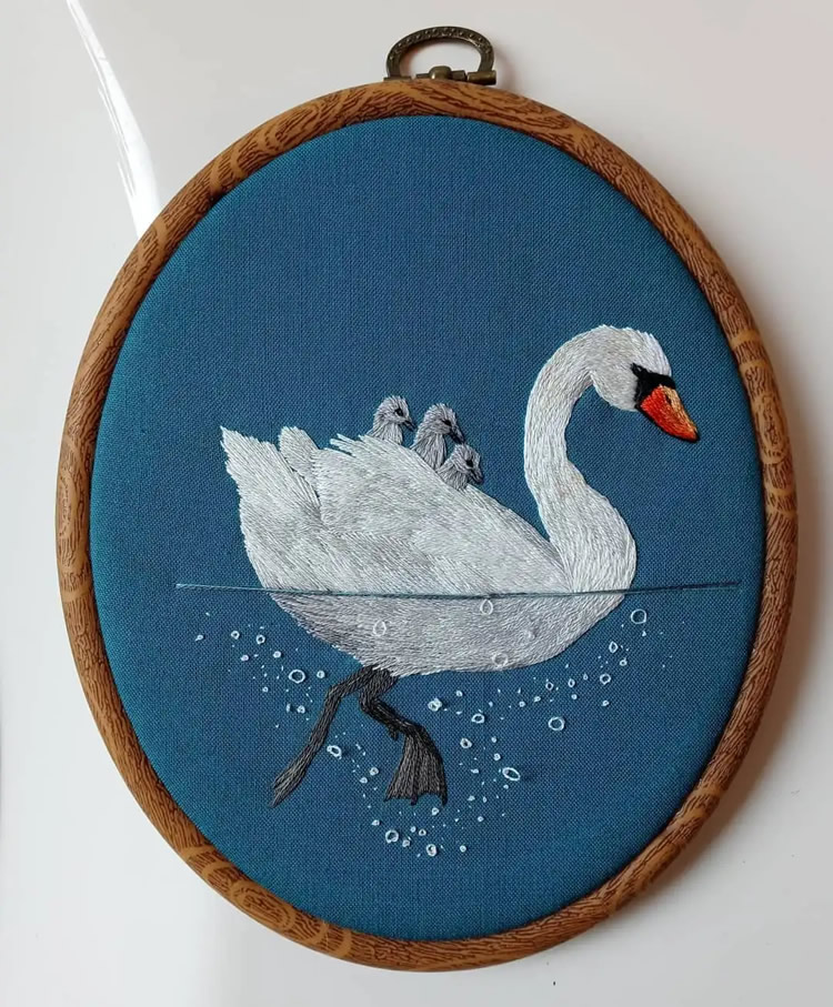 Embroideries Of Animals Plunging Into The Water by Megan Zaniewski