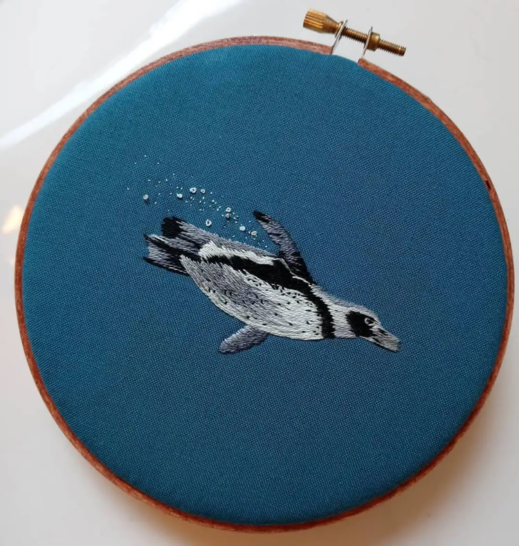 Embroideries Of Animals Plunging Into The Water by Megan Zaniewski