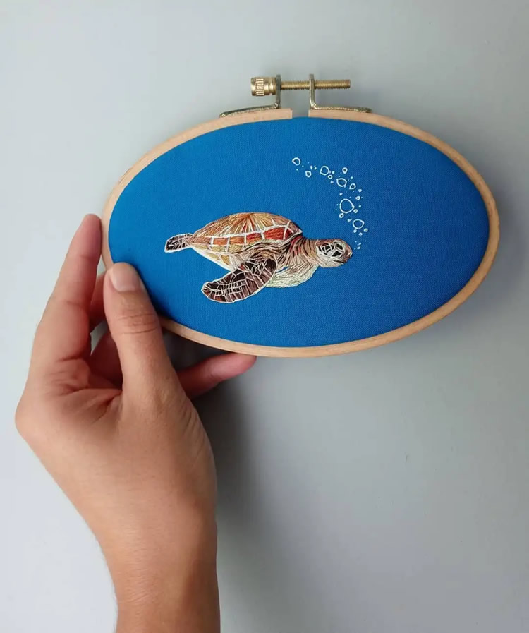 Embroideries Of Animals Plunging Into The Water by Megan Zaniewski