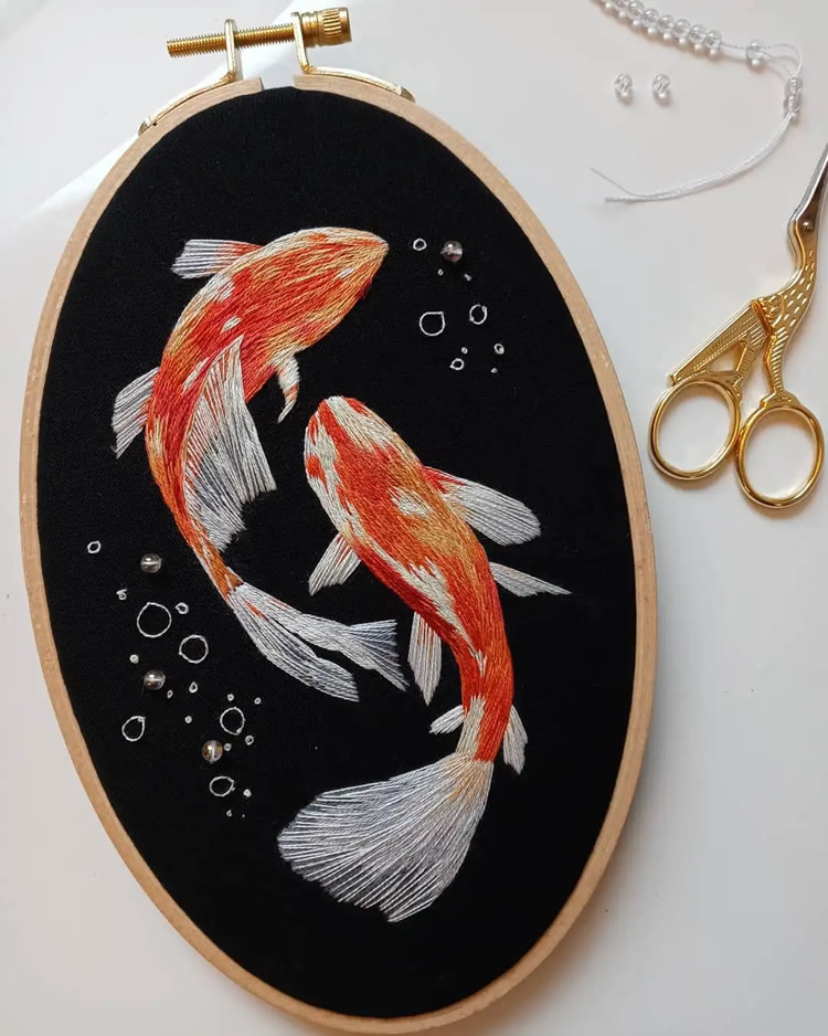 Embroideries Of Animals Plunging Into The Water by Megan Zaniewski