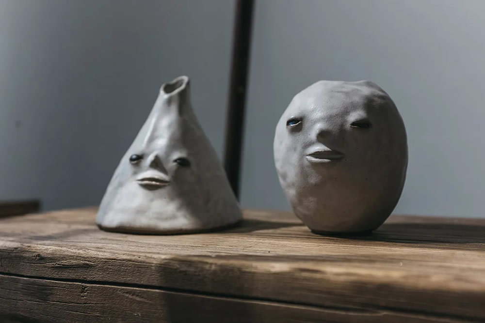 Emotive Little Faces Sculptures by Fan Yanting