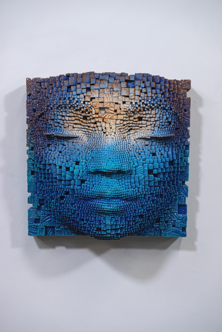 Serene Faces With Burnt Wood Sticks By Gil Bruvel