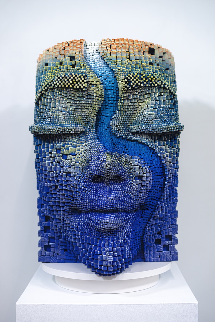 Serene Faces With Burnt Wood Sticks By Gil Bruvel