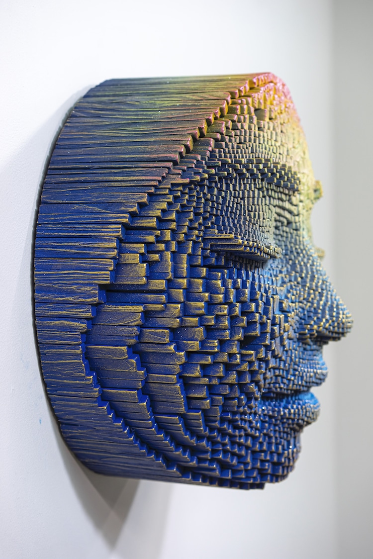 Serene Faces With Burnt Wood Sticks By Gil Bruvel