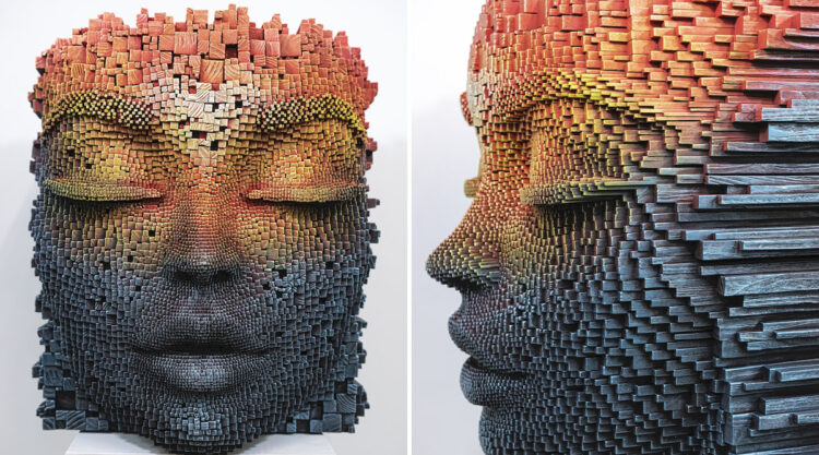 Artist Gil Bruvel Creates Serene Faces From Thousands of Burnt Wood Sticks