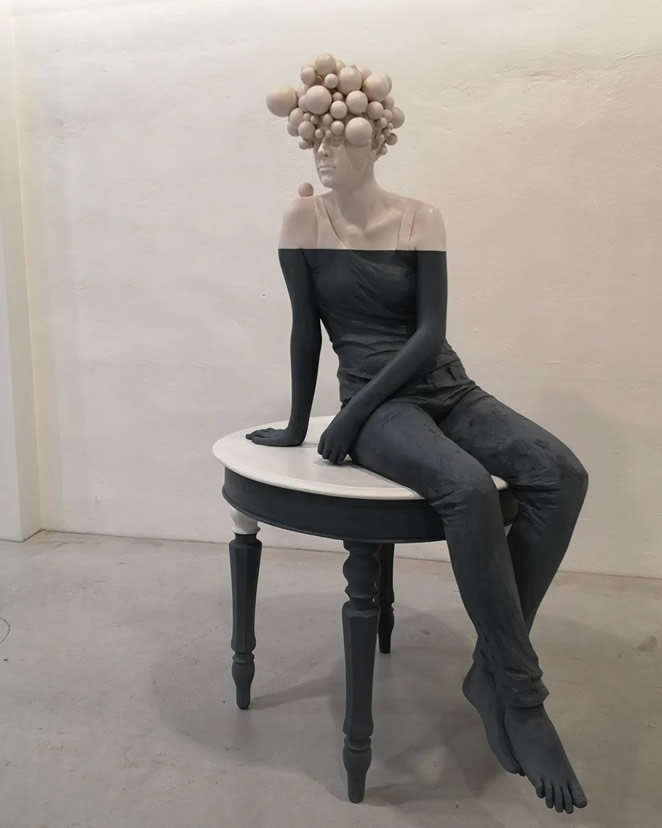 Figurative Wood Sculptures By Willy Verginer