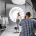 Learning The Art Of Photography: The Best Schools In The World 63 Photographer shooting a female model in a studio with umbrella lighting