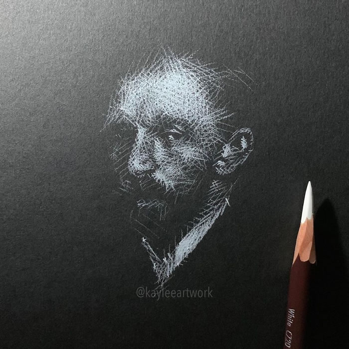 White pencil on black paper