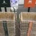 Two shopping basket stacks labeled 'I Can Do Myself' and 'I Need Help' at an Innisfree store