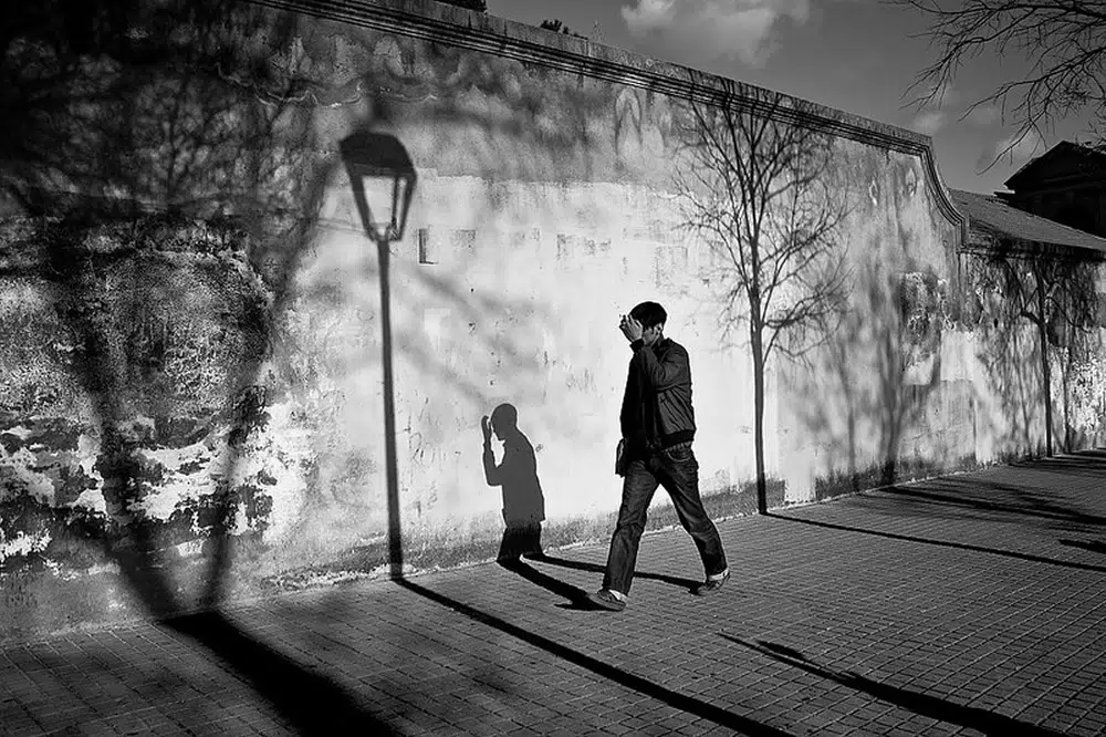 Chasing Shadows: The Intriguing Dance Of Light And Dark In Street