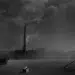 Iconic Visions: 30 Powerful Monochrome Photos by Renowned Photographers 73 Workers toiling near a smoky factory chimney in a dark b&w industrial scene