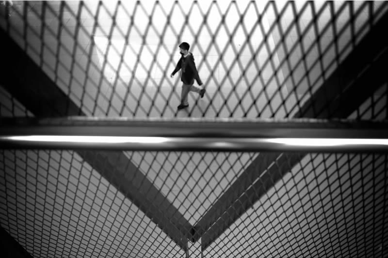 Light and Geometric Patterns in Black and White Street Photography by Nugroho Irianto